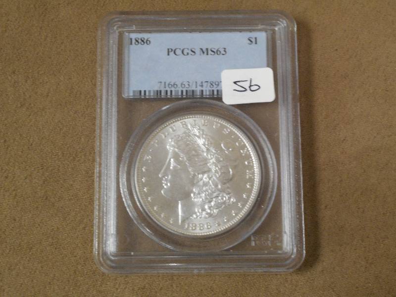 1886 Morgan Silver Dollar, NGC Grad...