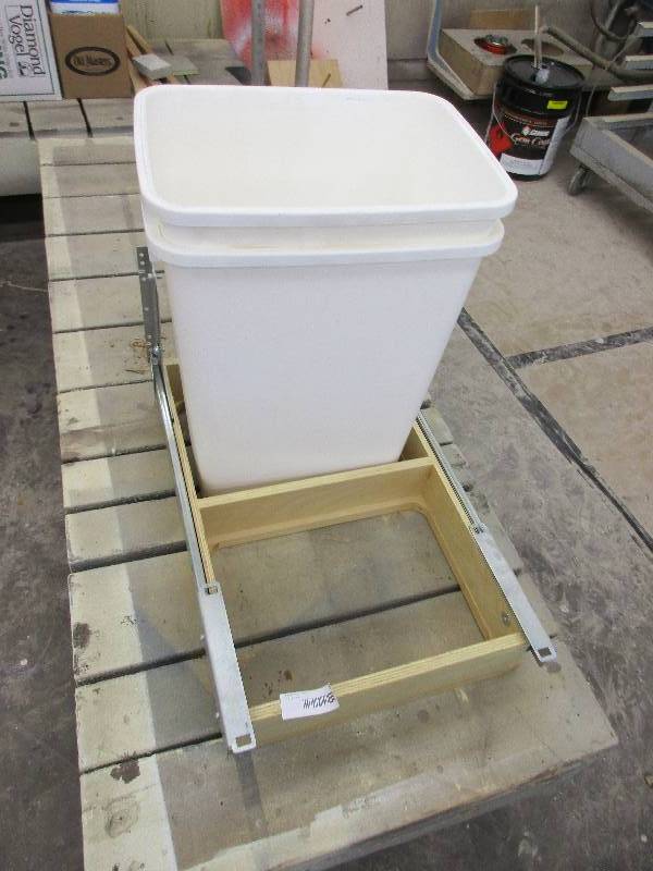 Cabinet drawer waste basket setup