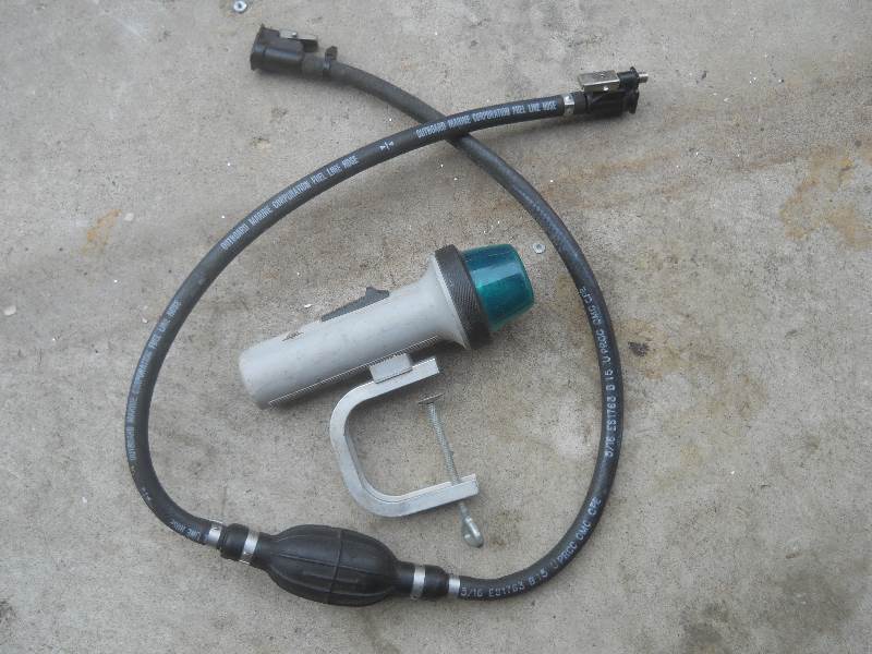 lot 5 image: boating lot fuel line and clamp on light