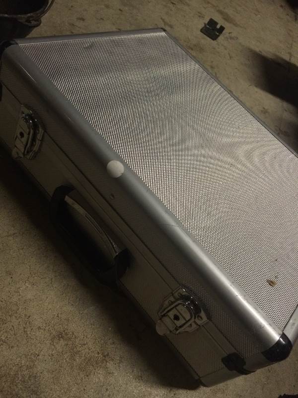 lot 37 image: small metal gun  suitcase