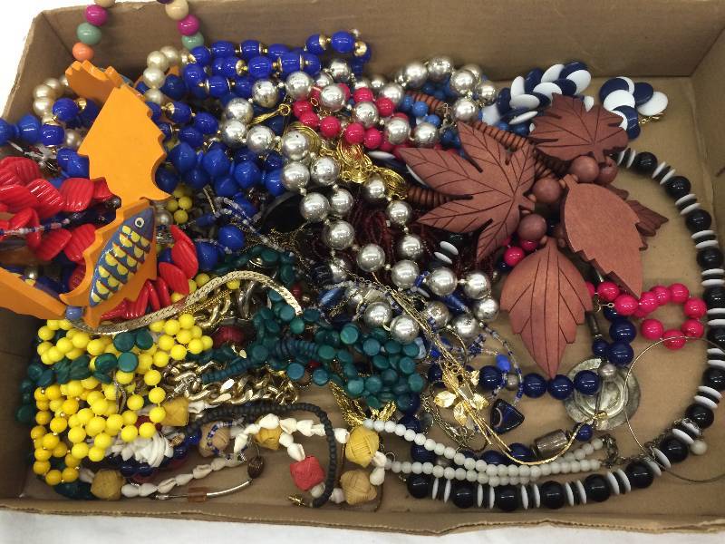 flat of necklaces and jewelry