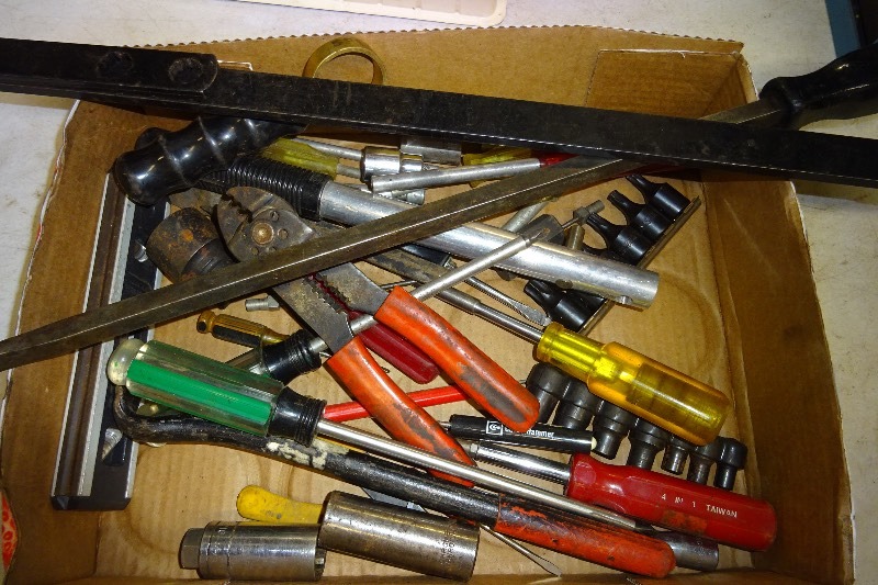 Misc screwdrivers, sockets, wire strippers, level, and more