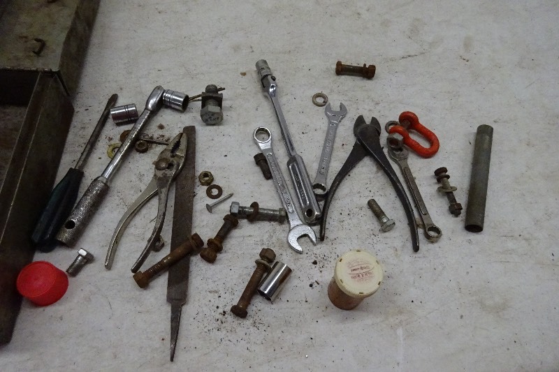 Pliers, side cutters, file, misc nuts and bolts, case, snap on sockets, swivel socket holder