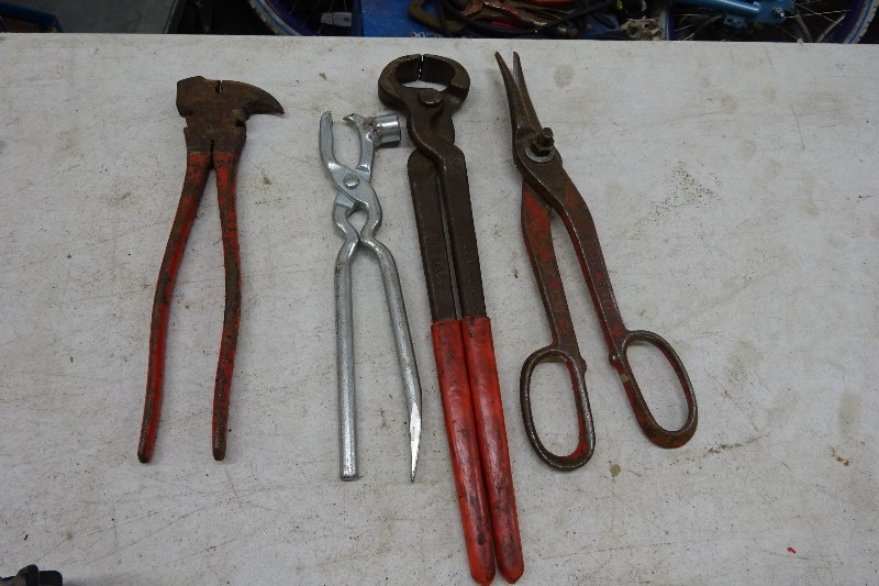 Tin snips, nail puller, pliers, gripper