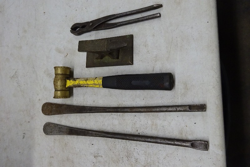 Brass hammer, pliers, vise, 2 flat chisels
