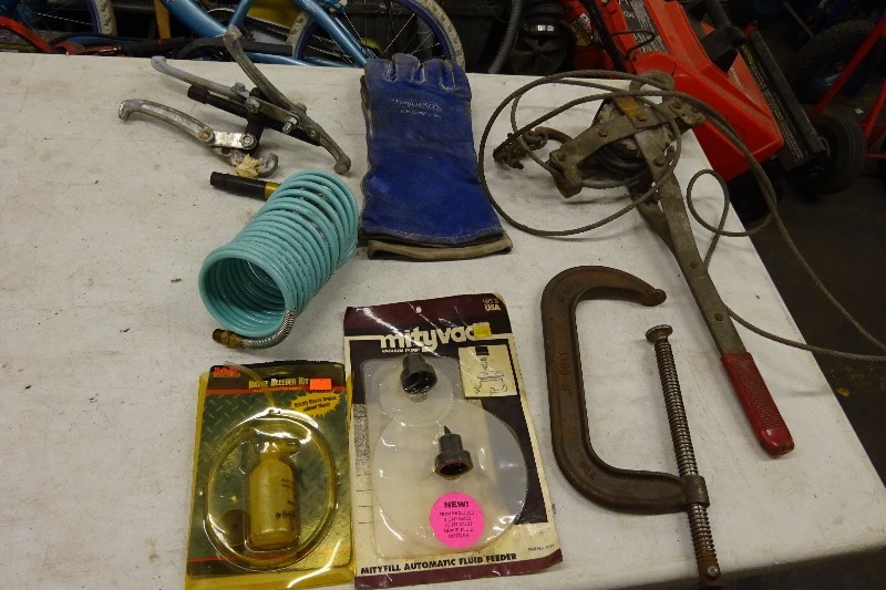 c clamp, air hose, gear puller, com a long, leather gloves, automatic fluid feeder