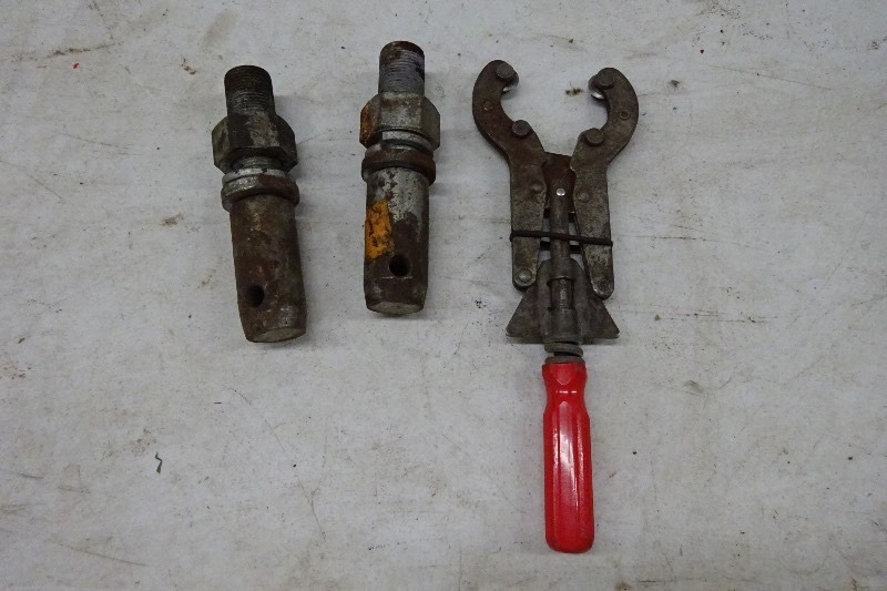 2 hitch pins, pipe cutter