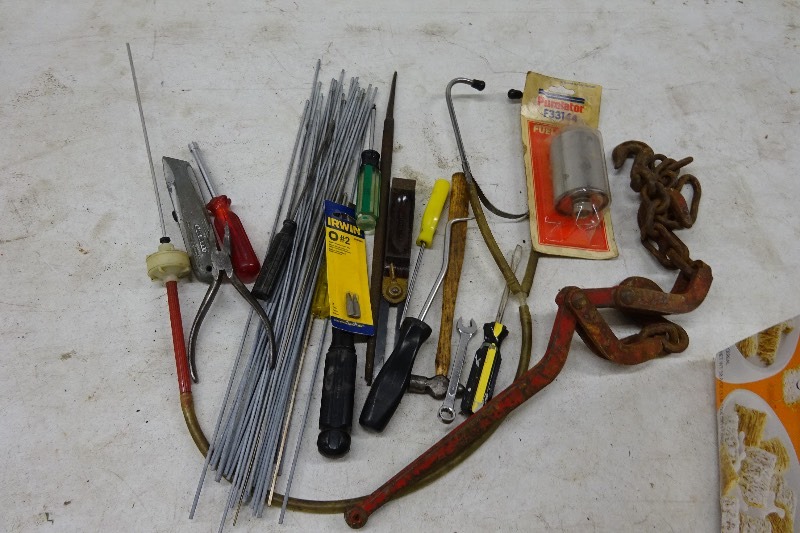 Load tie down, files, razor blade knife, screwdrivers, wrench and more