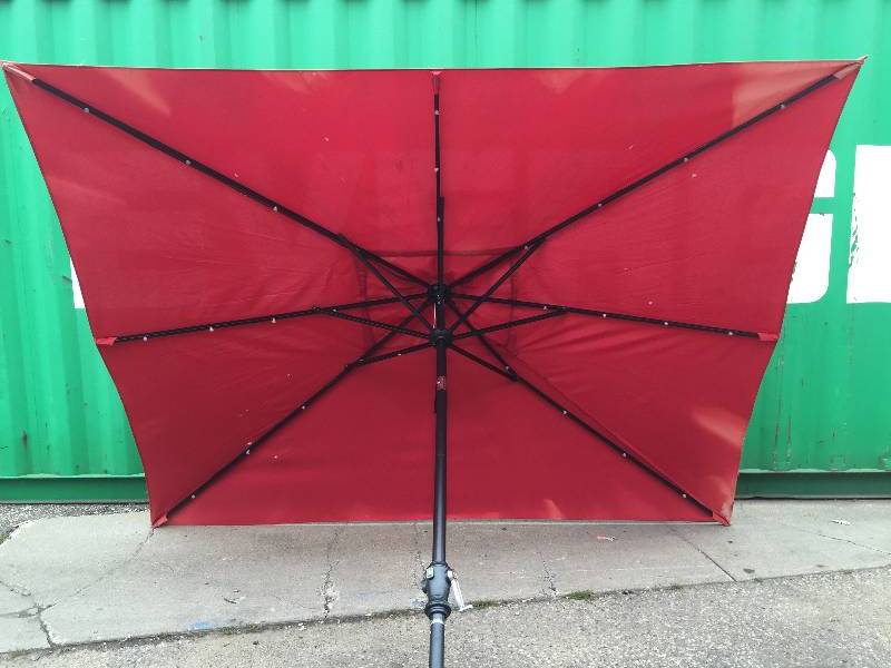 lot 193 image: Astonica 9 ft. Rectangular Solar-Powered Patio Umbrella in Scarlet
