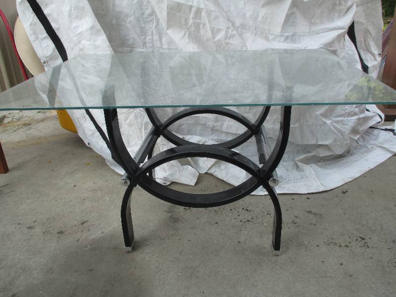 lot 21 image: black metal base table with glass t...