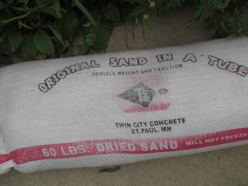 lot 152 image: 60 lb sand in a tube, just in time ...