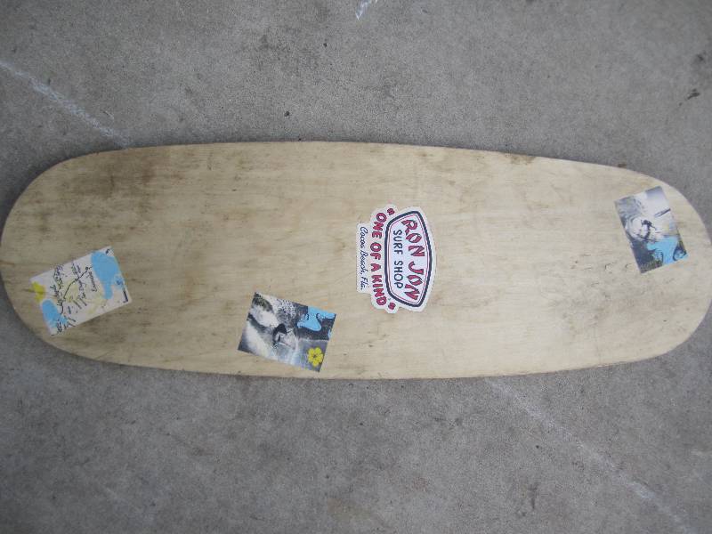 lot 129 image: Wood surf curout with decal from Ro...