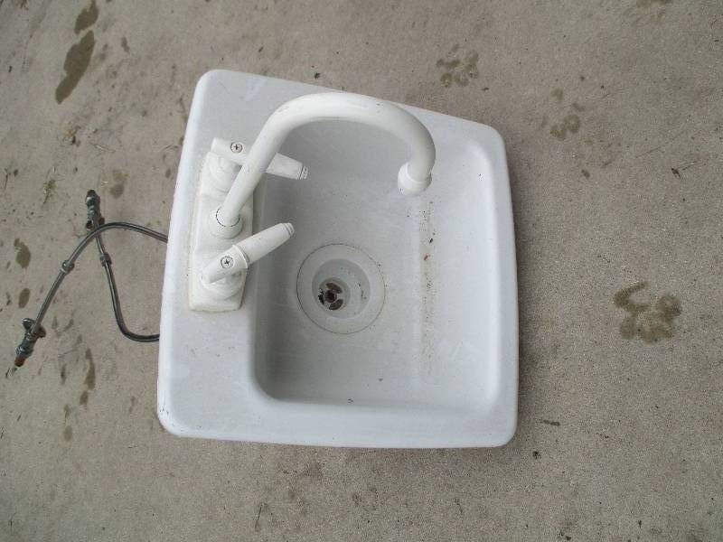 lot 58 image: Sink with faucet...
