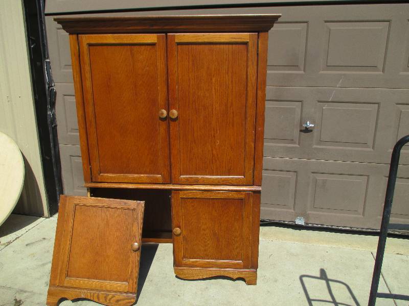 lot 84 image: Large wood fold out desk, one door ...