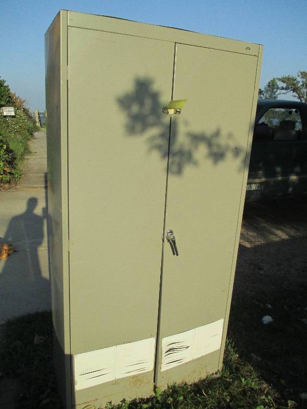 lot 99 image: Metal storage cabinet, 3 feet wide,...
