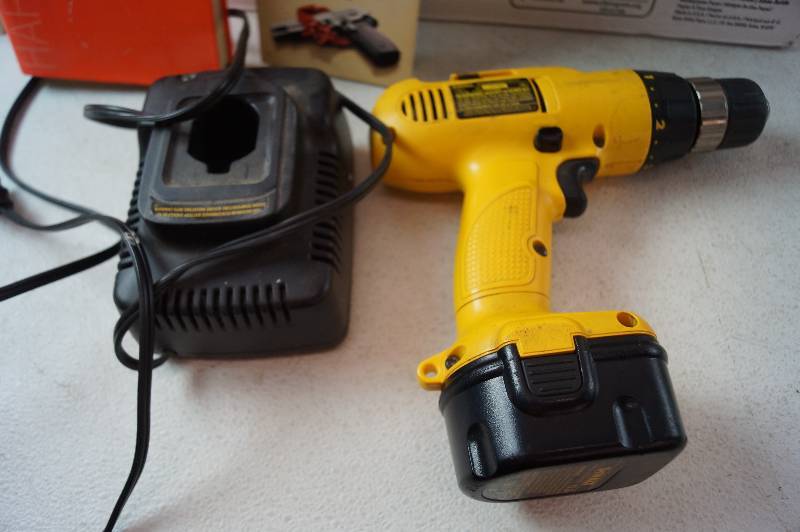 lot 29 image: Cordless Drill, Books