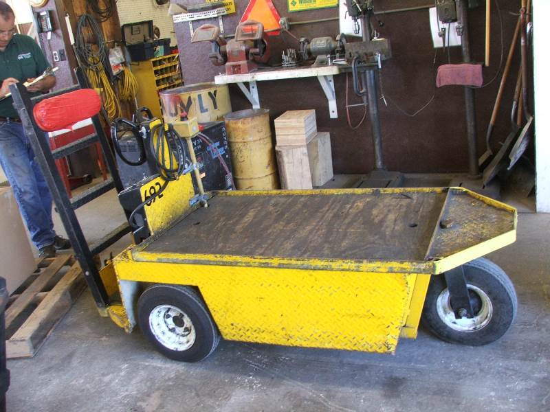 lot 8 image: Ez Go Stock Picker Cart