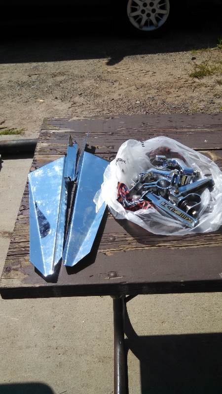 lot 110 image: Harley Chrome Air deflectors and Highway pegs