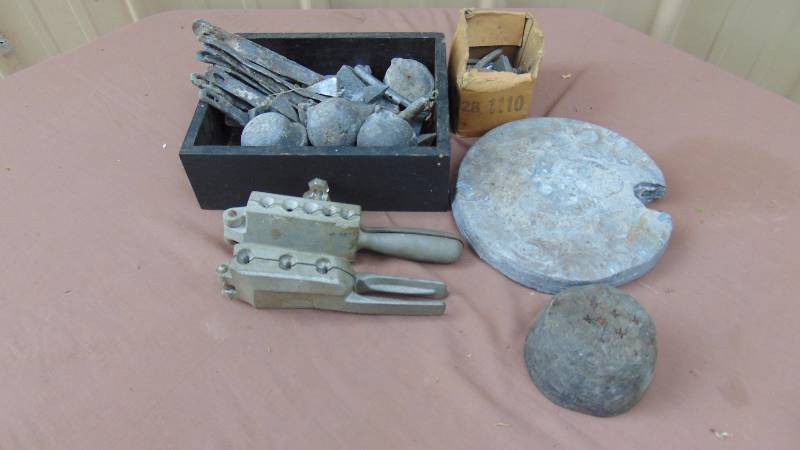 lot 106 image: Sinker Molds w Lead