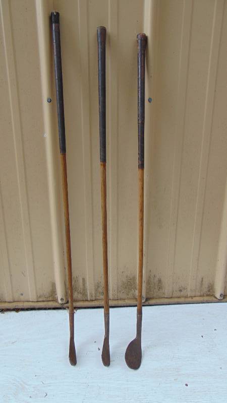 lot 123 image: Antique Wood Golf Clubs
