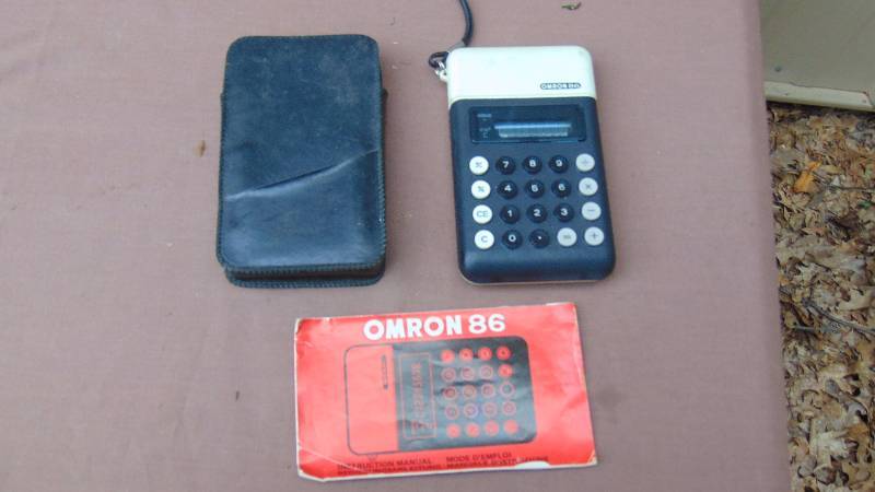 lot 211 image: Omron Caculator