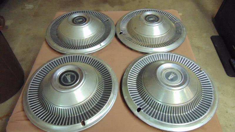 lot 259 image: Vintage Ford LTD Hubcaps