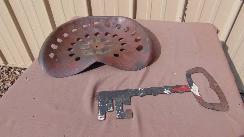 lot 348 image: Vintage Metal Tractor Seat and Metal Key