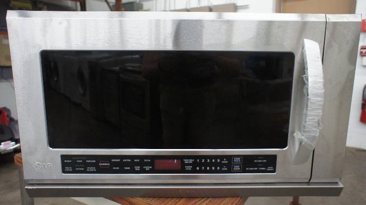 lot 13 image: LG Microwave - Model # (LMHM2017ST)