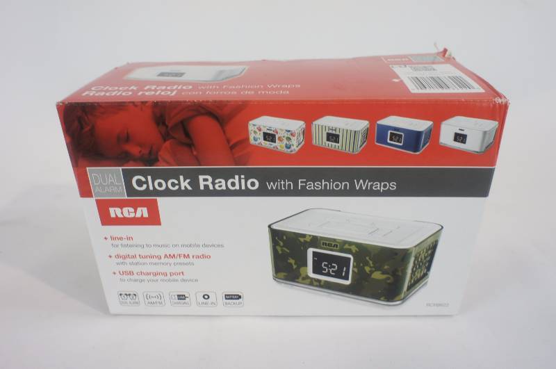lot 13 image: RCA Dual Alarm Clock Radio with Multicolor Fashion Wraps