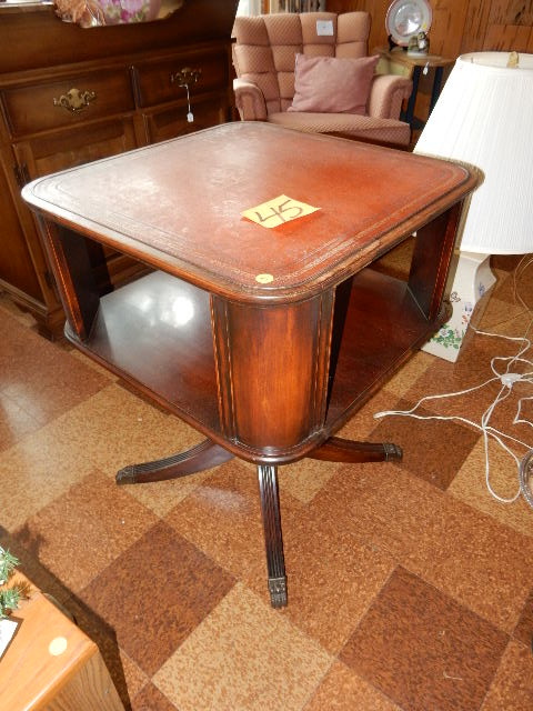 lot 45 image: 2 level, end or occasional table with leather top .