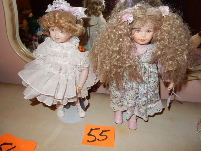 lot 55 image: 2 dolls on stands. Delton Doll on Stand Royal Heirloom Collection.Porcelain heads