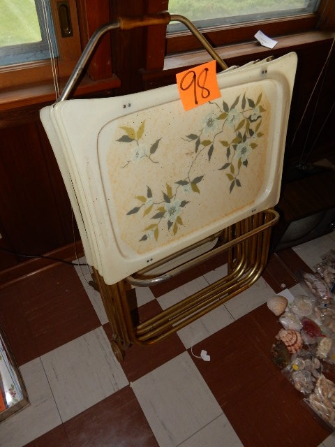 lot 98 image: Mid Mod style TV Trays and stand.. Have a stain on top.. Trying to remove