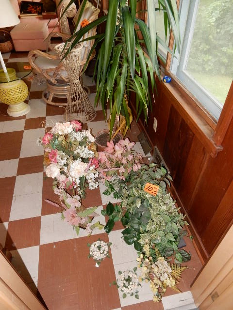 lot 102 image: Misc. Artificial Floral and Vines as pictured.   About 5 ft high Palm.. This one is REAL.. Looks to be in good shape.  RESCUE THIS ONE.. Give it a good home