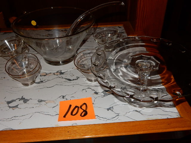 lot 108 image: Pedestal cake plate and punch bowl with glass ladle and 4 cups