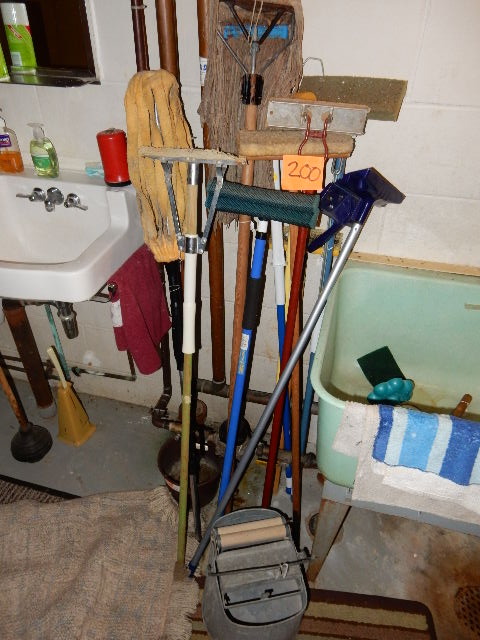 lot 200 image: Misc. Mops, Handles etc.. Most of the heads are in bad shape, but the handles are good.  Vintage Mop bucket, DELUXE