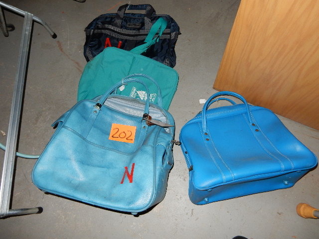 lot 202 image: 2 Bowling Ball Bags, 2 duffel type bags, 1 Canvas and leather strap bag