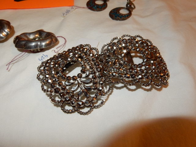 lot 1L image: Misc. Necklaces and Clip on earrings.. Gold plated compac.. Hair burrets.. Dauplaise necklace.  One necklace with lots of Turquoise stones.