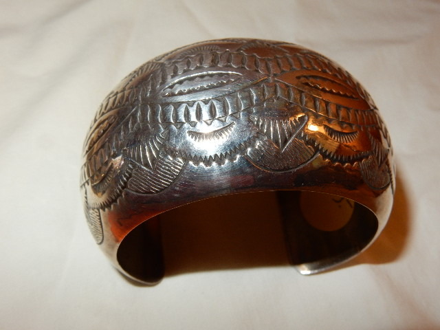 lot 1S image: Troika Quarts Watch mounted on bracelet with flapper woman  VERY NICE bracelet.. This must be some type of high quality metal as it was priced at 135.00 in the previous sale.. Not sure.. Please inspect.