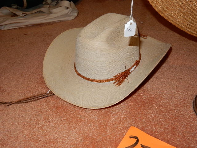lot 272 image: 2 hats.. Cowboy hat.. La Providencia.  Size 55..  Womens straw type hat with stand.