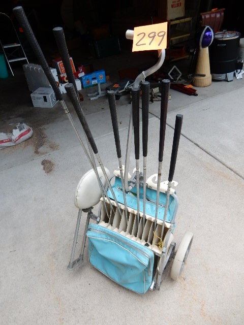 lot 299 image: Set of Patty Berg Womens golf clubs and pull bag..