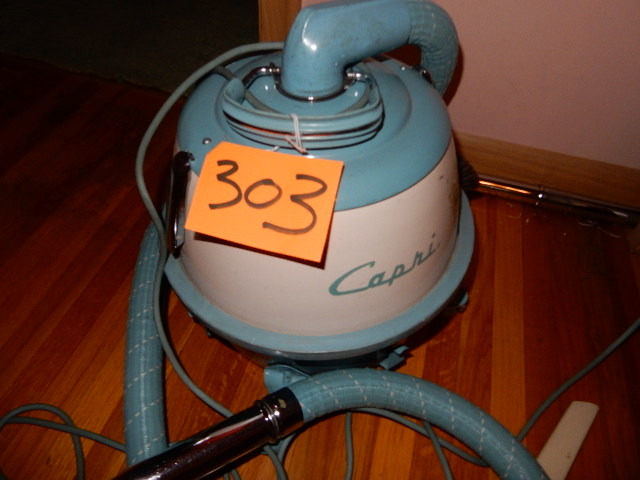 lot 303 image: CAPRI, Vintage Vacuum Cleaner with attachements