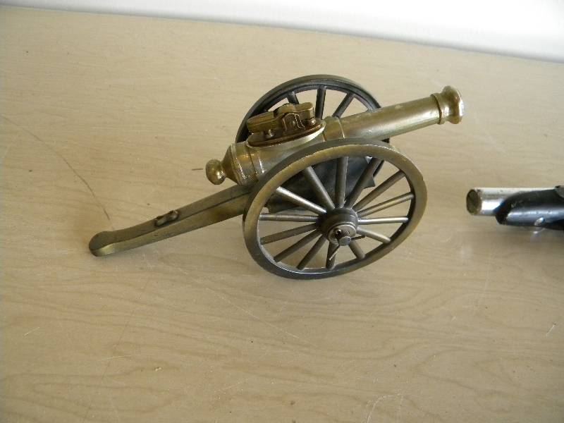 Vintage canon  and gun lighters
