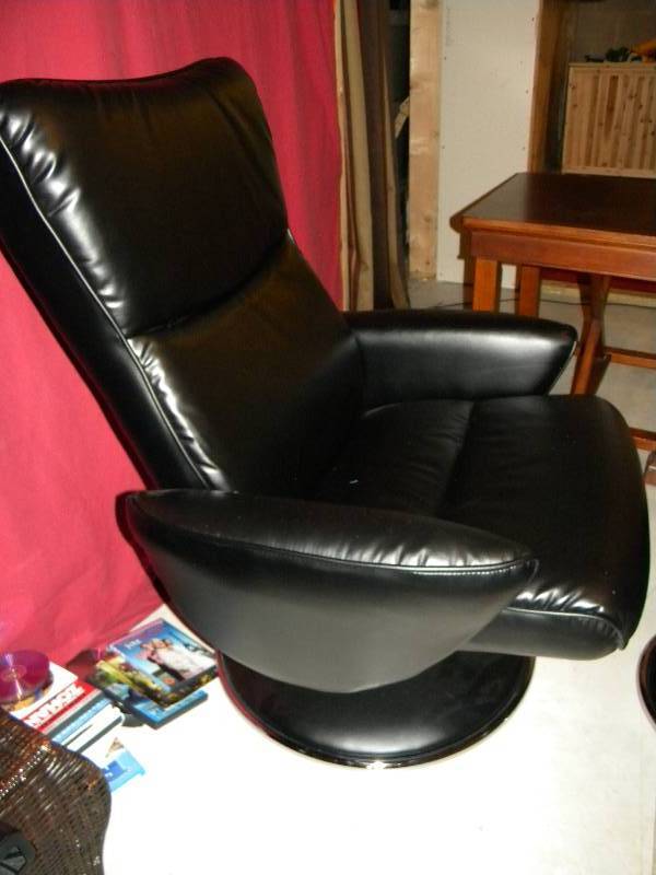 Black leather chair and ottoman