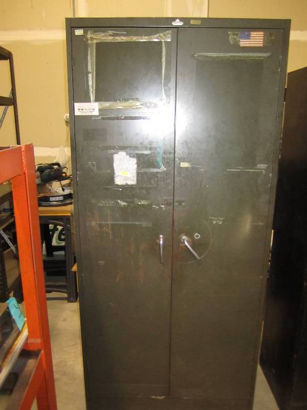 lot 100 image: storage cabniet ( tall green) ...