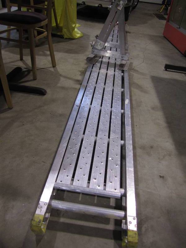 lot 122 image: aluminum scaffold with ladder on on...