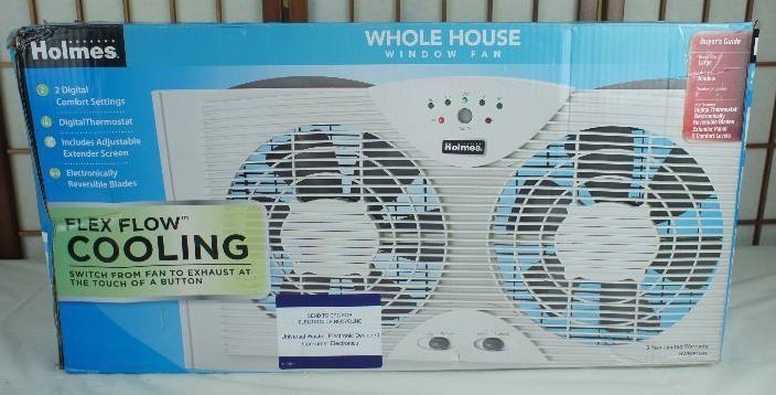 lot 29 image: Holmes Window Fan with Digital Thermostat