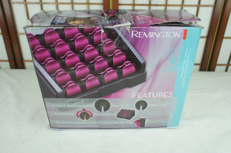 lot 26 image: Remington Pink Silk Ceramic Heated Clip Setter, 1-1 14 Inch, Pink