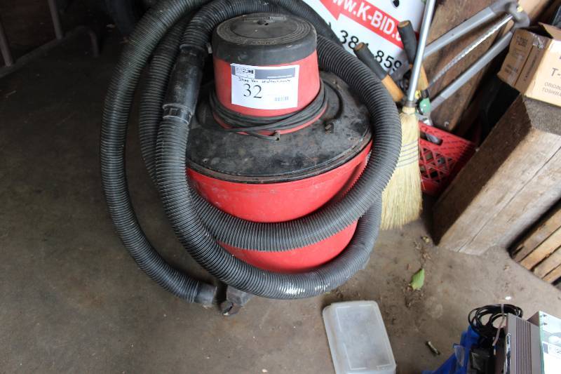 lot 32 image: Shop Vac Vacuum wHoses 16Gal Wheels.