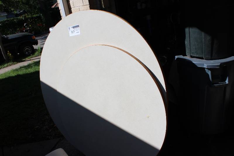 lot 63 image: Lot of (2) Circular Table Tops 48 Diameter 60 Diameter.