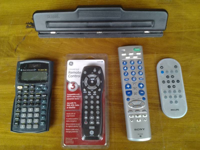Calculator, Remotes, Paper Punch